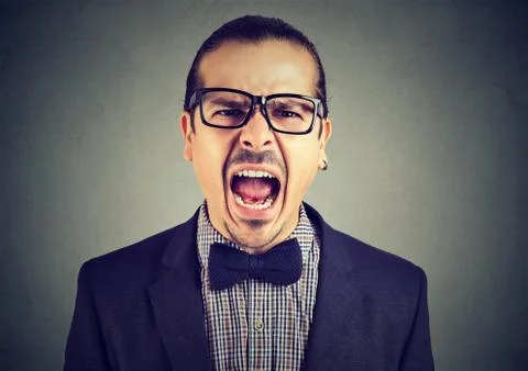 Screaming expressive man Stock Photos