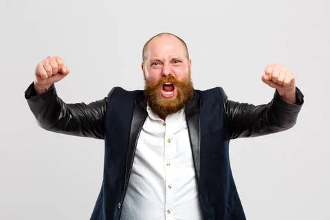Screaming man with hands up Evil screaming man with hands up on clean gray... Foto stock