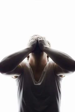 Screaming Man over white background. Emotion boy in a shirt Stock Photos