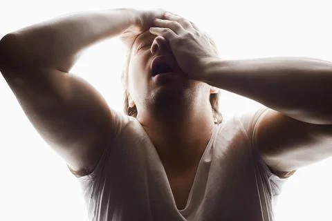 Screaming Man in studio isolated white background. Emotion boy Stock Photos