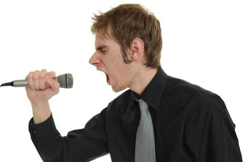 Screaming into microphone Stock Photos