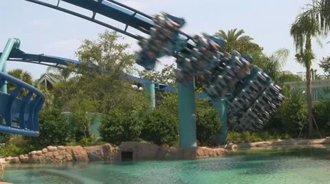 Screaming Passengers on a Flying Rollercoaster Stock Footage 21993031