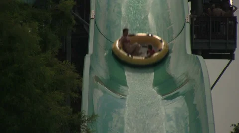 Screaming People Going Down Big Tube Water Slide Stock Footage 30345924