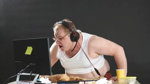 Screaming person while playing a video game on a computer, a person is having Stock Photos