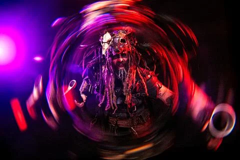 Screaming Viking Warrior with Axe and Red Purple Light Trails Stock Photos