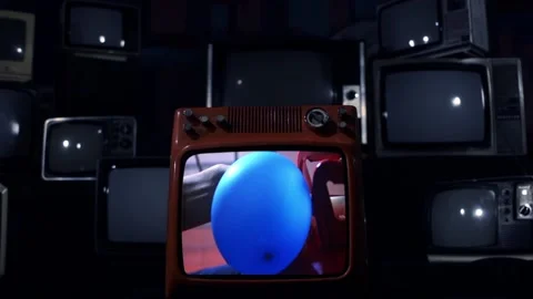 Screen Burst of Old TV Showing Helium Balloon Inflation - Close Up Video stock 117660412