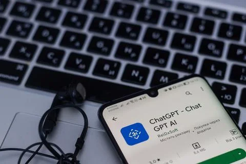 Screen with ChatGPT chat with AI or artificial intelligence. Man search for 写真素材
