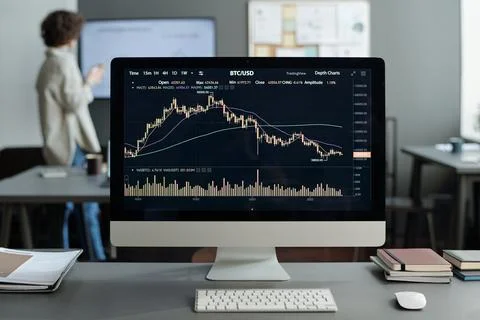 Screen of computer with financial chart and graph created by analyst Stock Photos