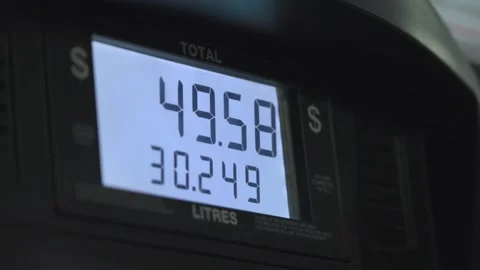 Screen in a gas pump showing rising gas prices Stock Footage 220094236