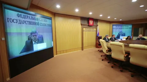 Screen with head of Rosstat Alexander Surinov at conference Stock Footage 37656355
