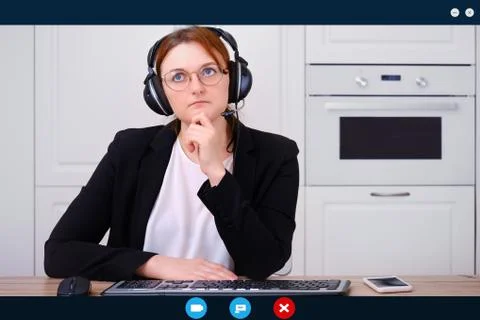 Screen interface programs for remote work, a woman conducts a conference thro Stockfoto's