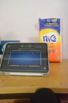 Screen of an iPad displaying 8 ball pool game application during the game Stock Photos