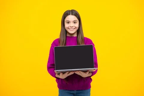 Screen of laptop computer with copy space mockup. Young girl student hold Stock Photos