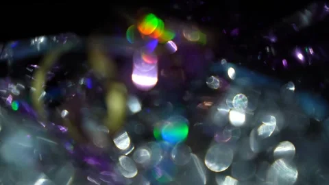 The screen lights up with a sparkling bokeh and beautiful colors. Stock Footage 315314657