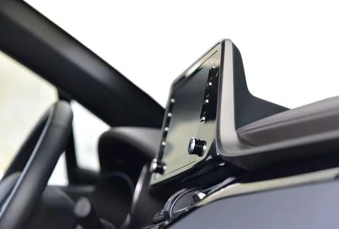 Screen multimedia system on dashboard in a modern car Foto stock