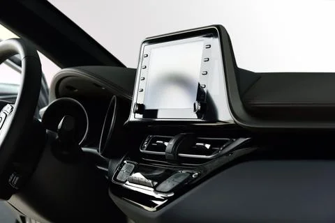 Screen multimedia system on dashboard in a modern car Stock Photos