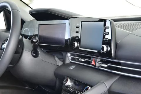 Screen multimedia system on dashboard in a modern car Stock Photos