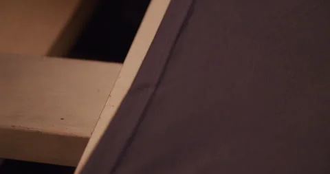 Screen printer places a shirt for tee shirt printing Stock Footage 248324432