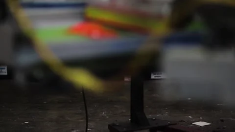 Screen printing shop, silk screen with squeegee on automatic press for Stock Footage 139387374
