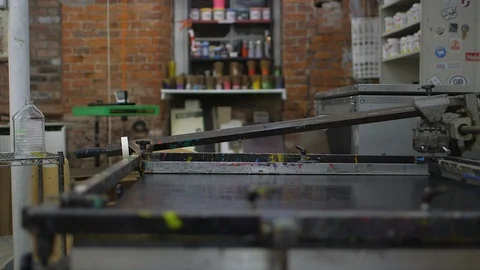 Screen Printing Studio with Machine Stock Footage 128979292