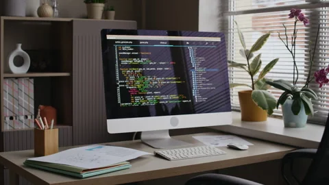Screen with Programming Script on Computer Monitor at Office Desk Stock Footage 321814479