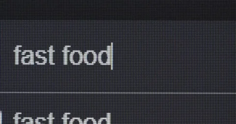 Screen search bar text typing: fast food restaurants Stock Footage 260733403