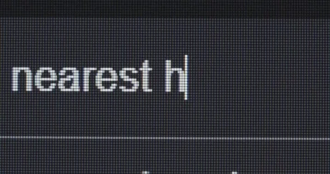 Screen search bar text typing: nearest hotels Stock Footage 278903057