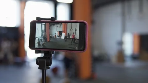 Screen smartphone video recording workout in gym Stock Footage 89774768