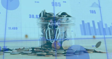 Off-screen source releasing coins into jar, visualizing savings growth through 스톡 동영상 311884539