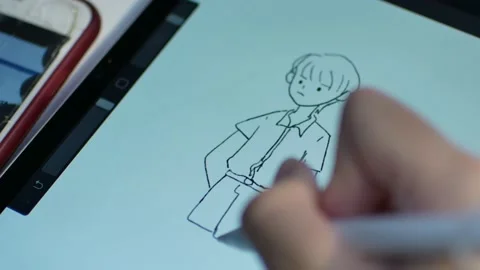 The screen of tablet white using digital pencil drawing cartoon in minim Stock Footage 151624014