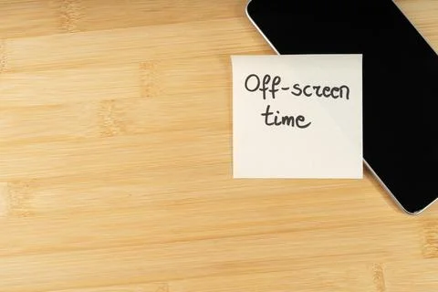 Off-Screen Time Reminder: Sticky Note on Smartphone Encouraging Digital Det.. Stock Photos