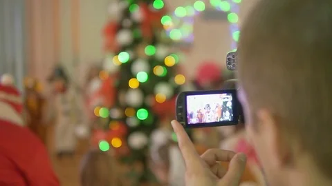 The screen of the video camera. Blurred background. Children's holiday. Stock Footage 84563858