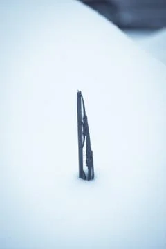 Screen wiper covered in snow Stock Photos
