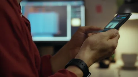 Screen. Worker at home using intelligence focused optimizes code for smartph Stock Footage 281087280