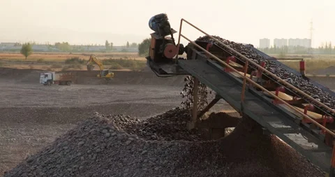 Screening and washing in open-pit mining. Sorted rocks move on conveyor belt Stock Footage 290123181