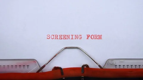 Screening form - phrase printed on an old typewriter in red letters, close up. Video stock 128399742