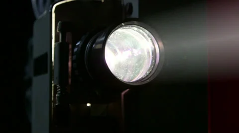Screening movies on vintage film projector Stock Footage