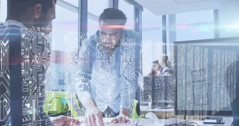 Screens with microprocessor connections against diverse two male colleagues Stock Footage 220387132