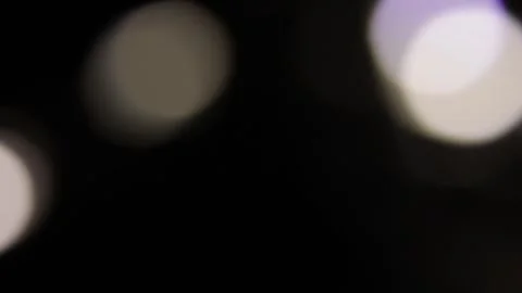 Screensaver video of lights moving quickly on a black screen 動画素材 317490266