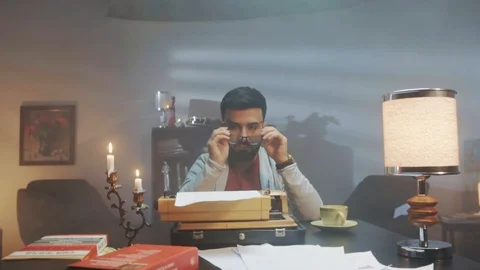 Screenwriter thinks how to write a screenplay Stock Footage 127116226