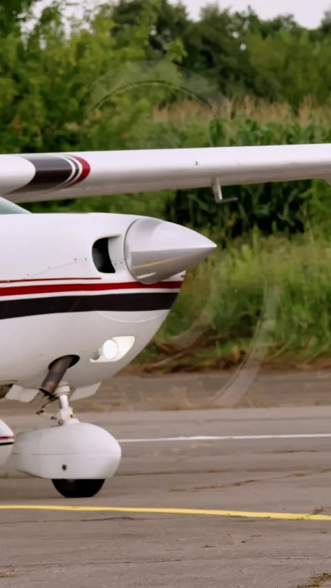 Screw aircraft. Retro plane. side view. Retro airplane propeller is working and Video stock 319939856