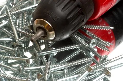 Screw and screw driver Stock Photos