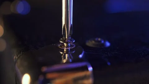 Screw is being screwed up by screwdriver Stock Footage 156636675
