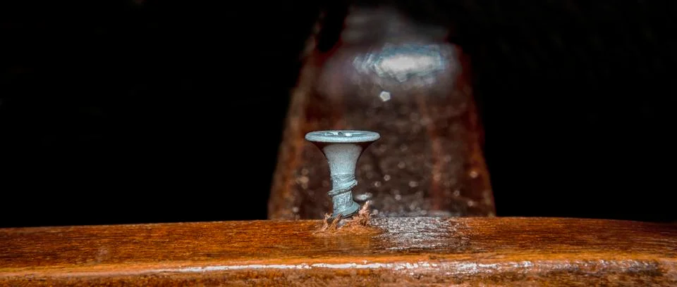 Screw in the board Stock Photos