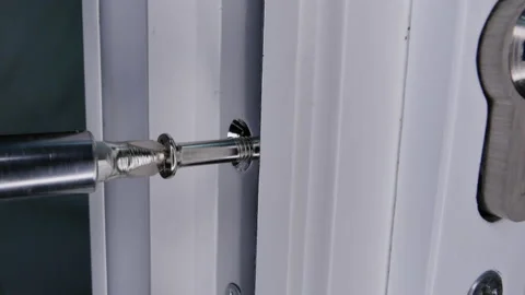 Screw bolt in a door lock Stock Footage 145758438