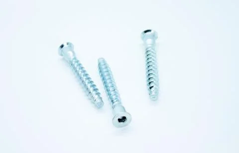 Screw bolt located on a white background Stock Photos