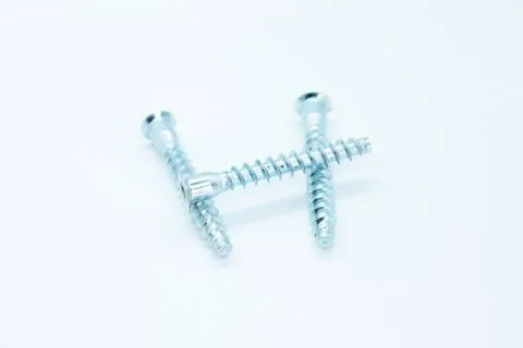 Screw bolt located on a white background Stock Photos