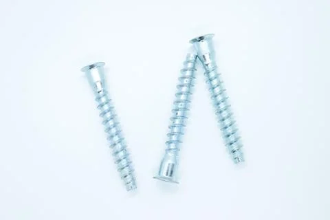 Screw bolt located on a white background Stock Photos