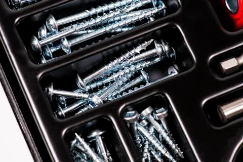 Screw in box on white background. Macro 库存照片