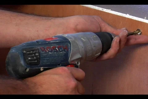 Screw in cabinet Stock Footage 540064